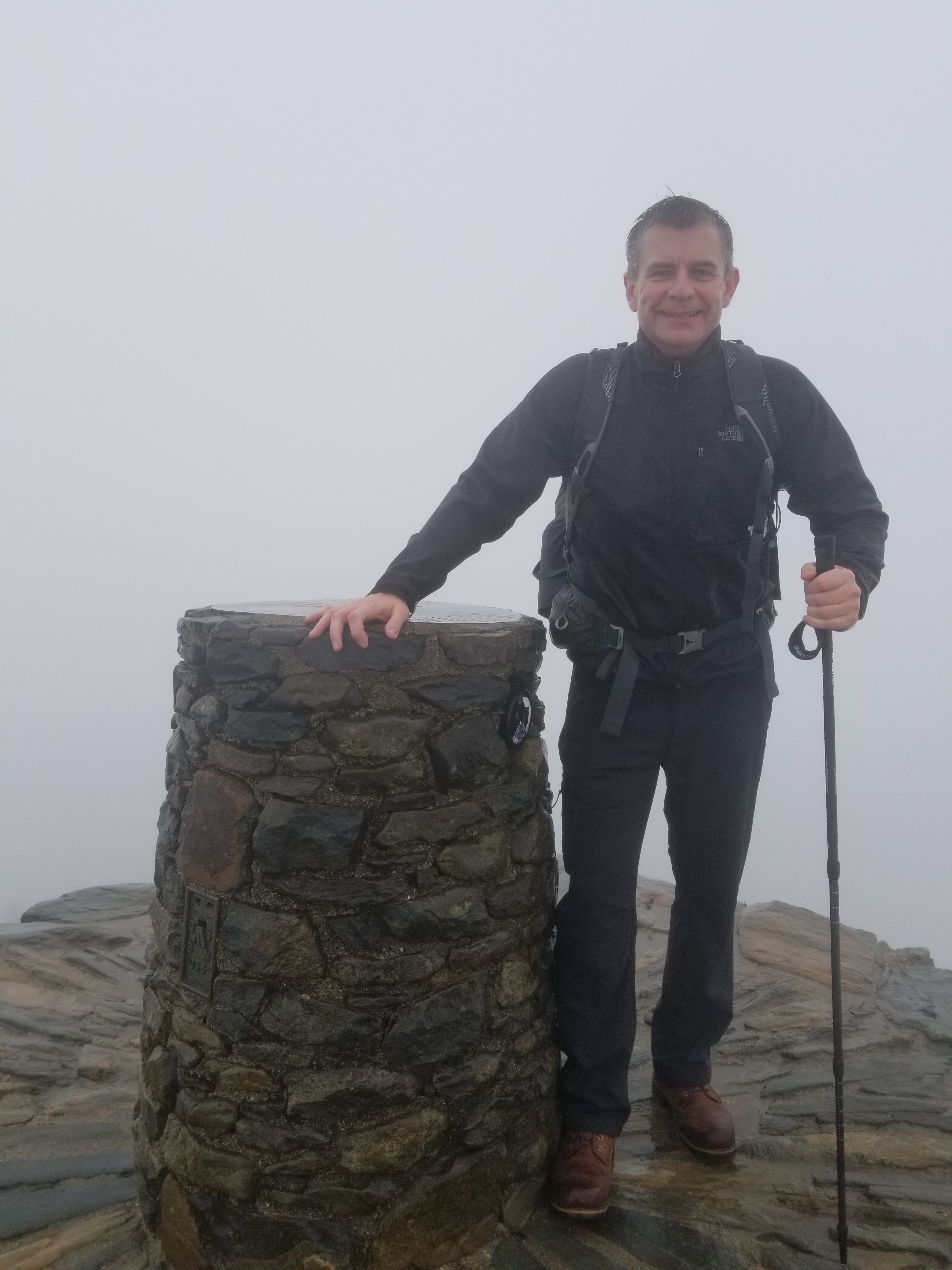 Nigel Yates on the summit of Mount Snowdon